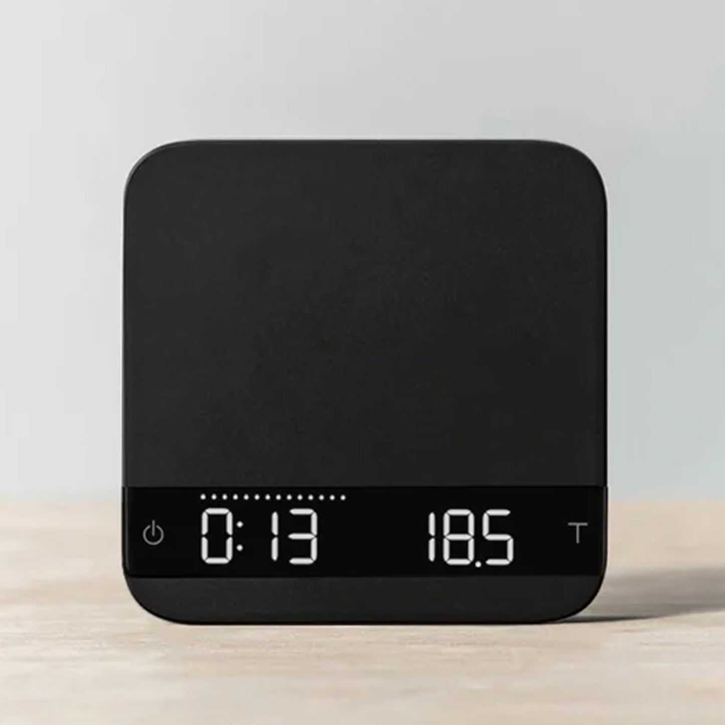 Acaia Lunar - Baristawaage in Schwarz mit digitaler Anzeige für präzises Kaffeewiegen am Siebträger.